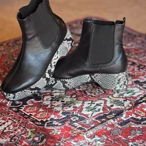 Black Leather Ankle Boots with Snake Print Sole